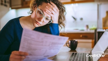 Woman reviewing the new federal tax laws